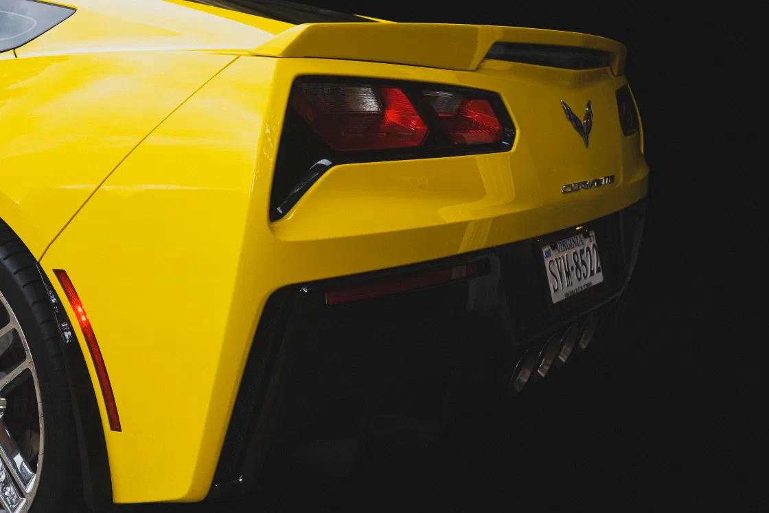 Rear spoiler and taillights of the Racing Yellow Corvette